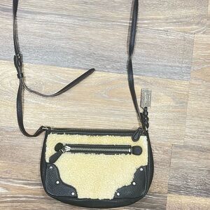 Coach small Rhyder  Pochette Shearling